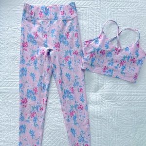 LoveShackFancy x Bandier Floral Printed legging and strappy bra.